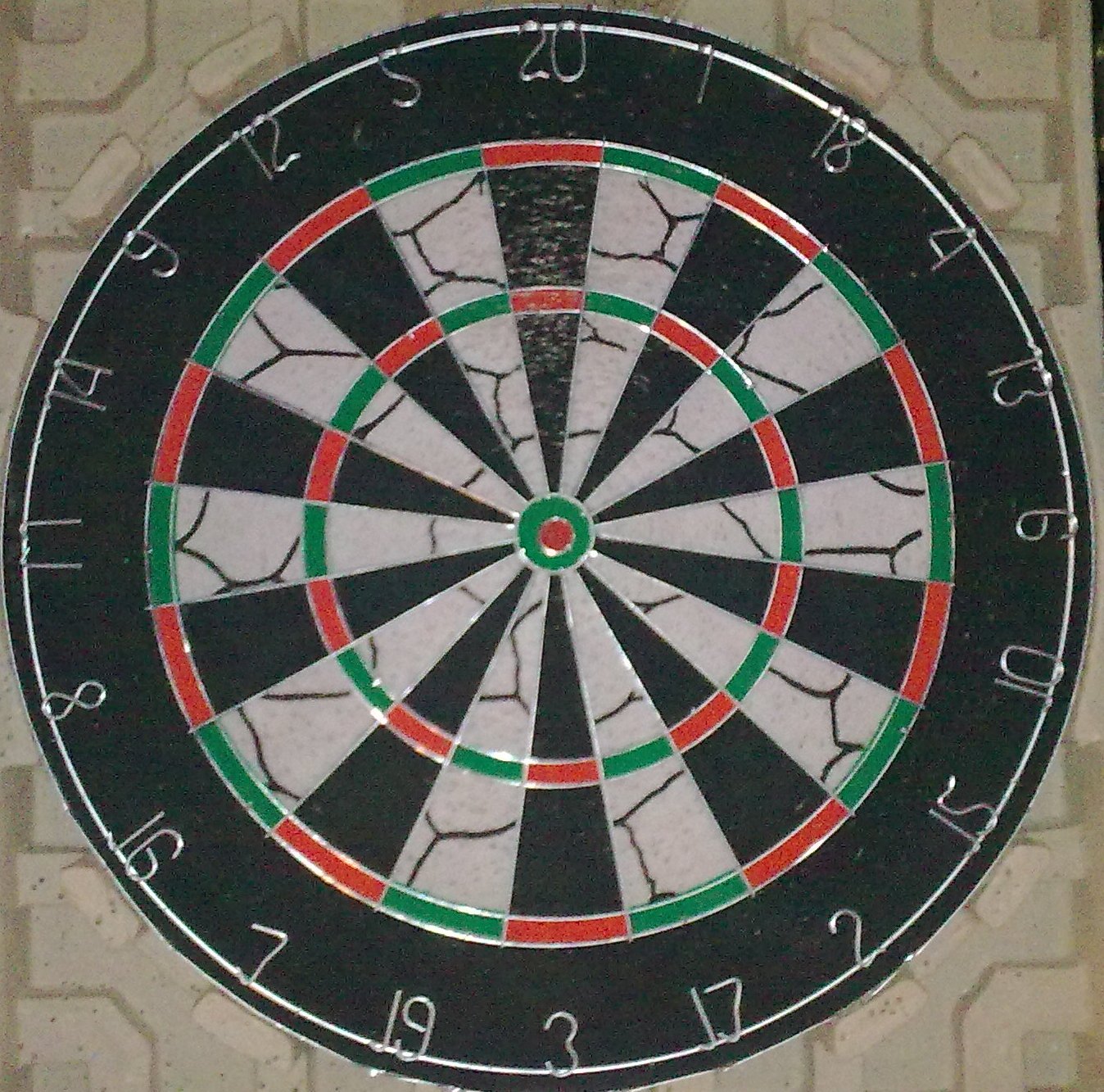 Photograph of a real steel-tip dartboard